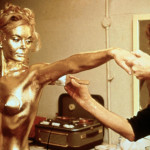 Naked bond girl in gold body paint