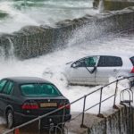 Guy drives his truck into 27′ waves